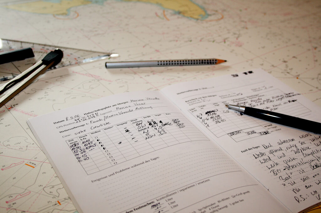 Traditional paperback marine logbook with entries, updated roughly every half hour.